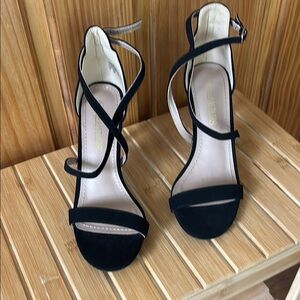 Sleek Black Heels with Strappy Design